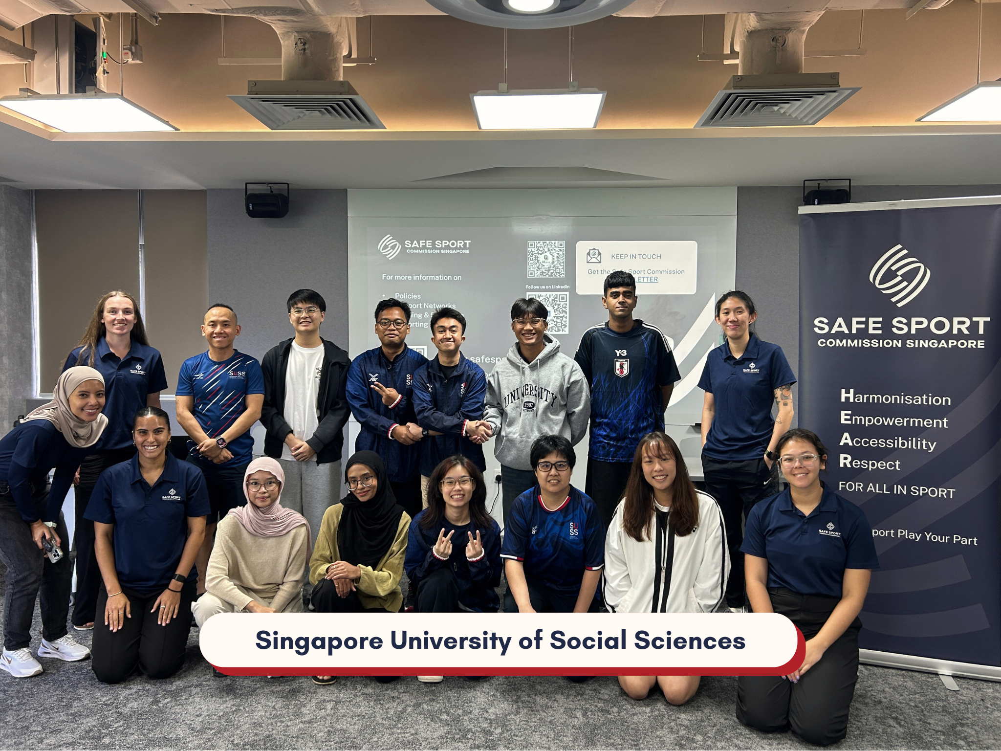 A group of students with Safe Sport facilitators in a group photo together